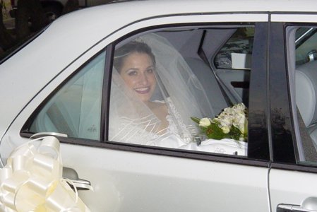 A bride in a wedding car